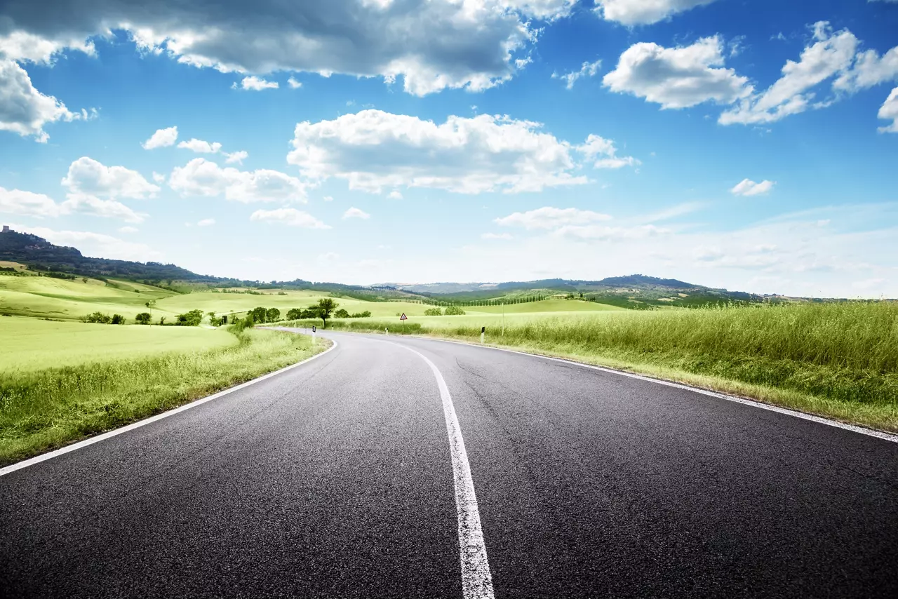 asphalt road in Tuscany, Italy